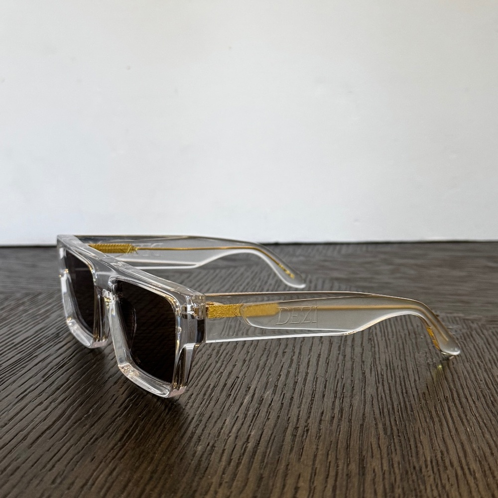 DEZI Clear Frame Sunglasses with Gold Accents - Black Lenses